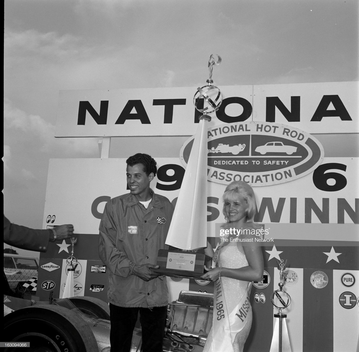 11 Miss Nationals 1965 presents the winner's trophy to driver Don Prudhomme.jpg