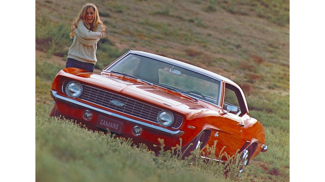 137-1969-Camaro-327-with-model-in-hill-country (2).jpg