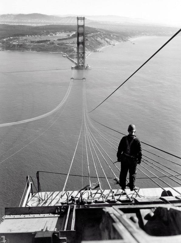 17 A man standing on the first cables.jpg