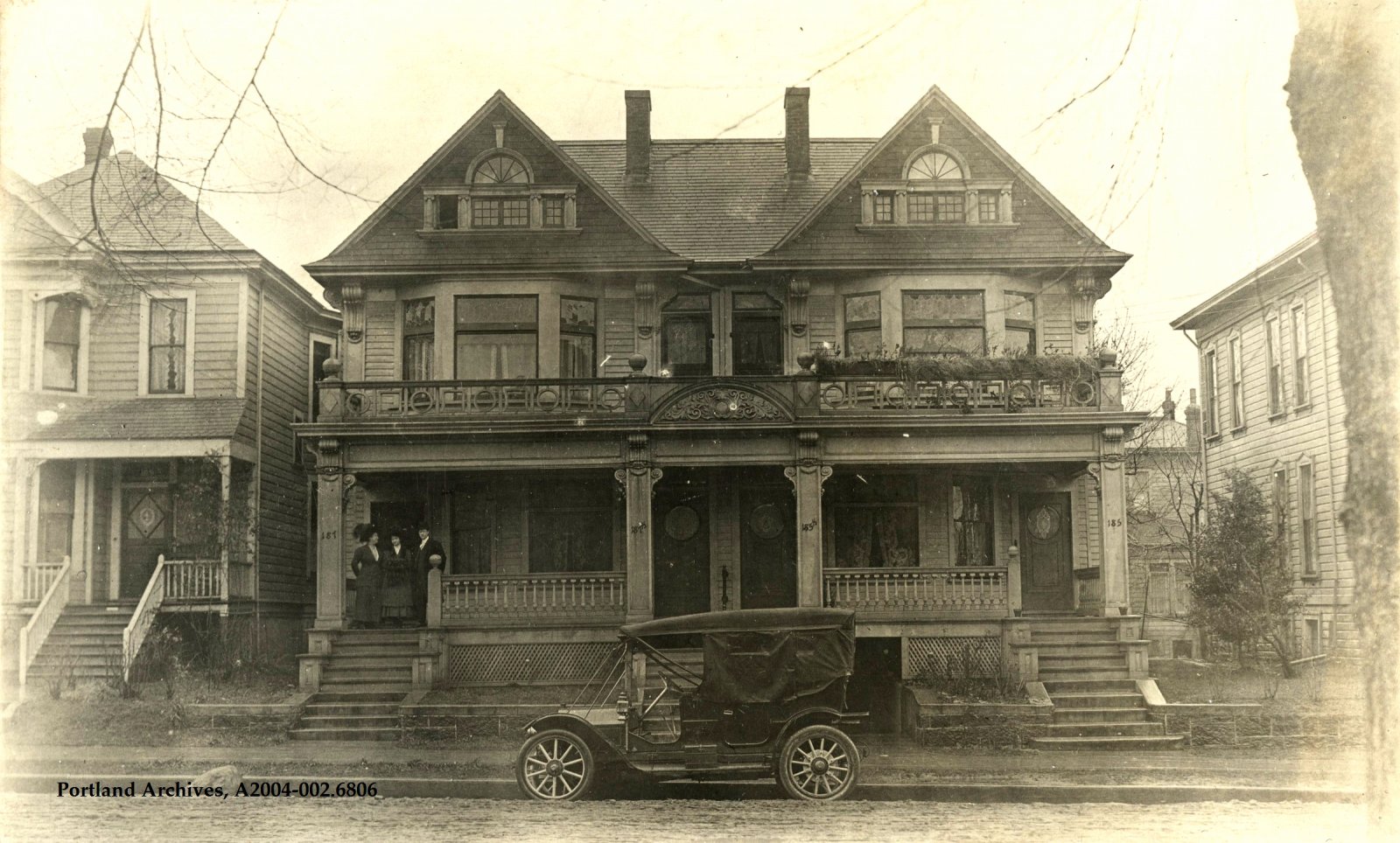1911_front-view-of-a-4-plex-home-with-two-.jpg