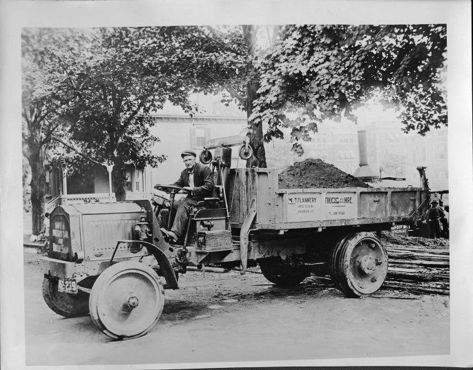 1918 Packard dump truck hard at work somewhere in America..jpg