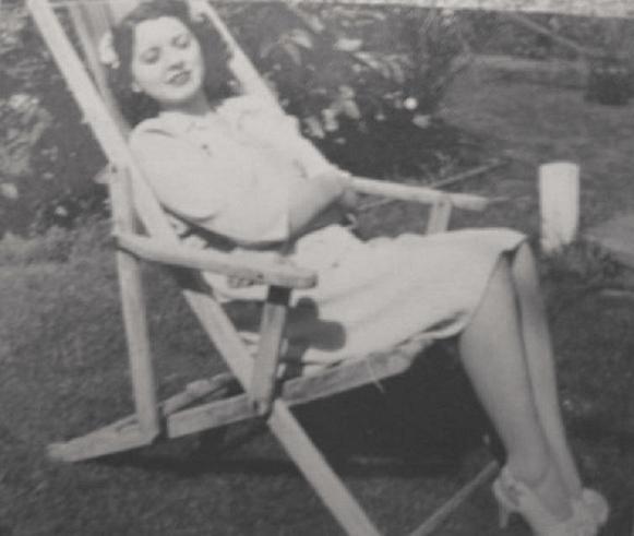 1941 ish Jenny in folding chair.jpg