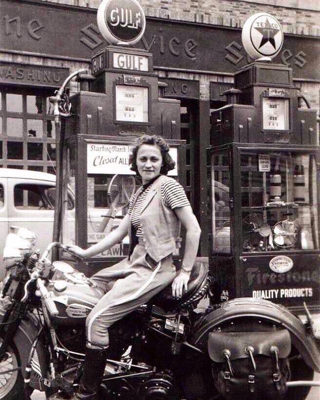 1941 motorcycle woman gas station.jpg