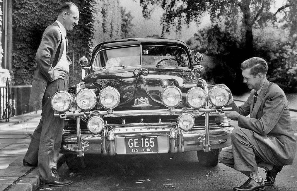 1951 GE automotive lighting engineers Val Roper, George Meese with Lincoln.jpg