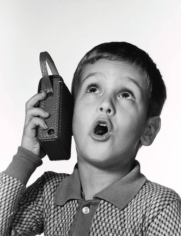 1960s-boy-holding-transistor-radio-vintage-images.jpeg