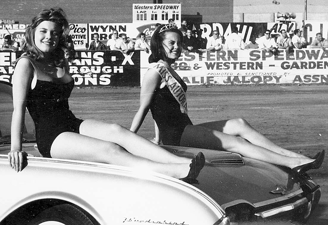 1961-davis243-women on car.jpg