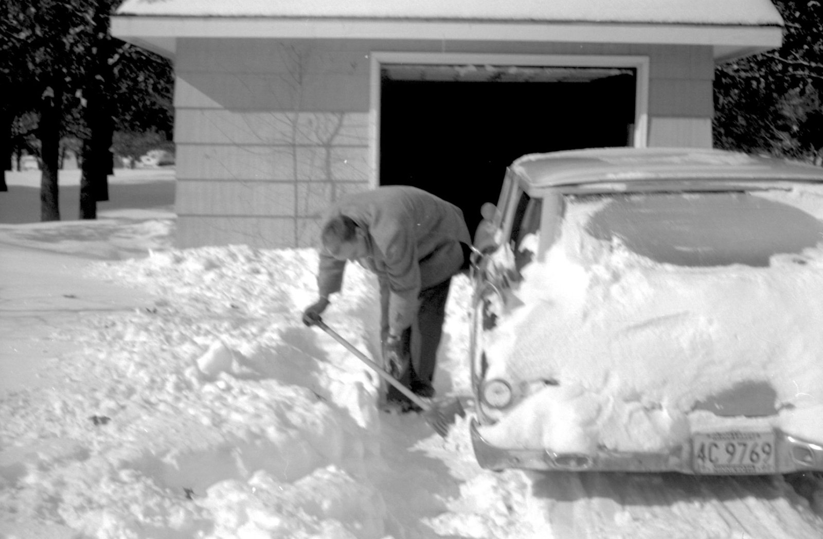 1962.12cB#14-Fred-shoveling.jpg