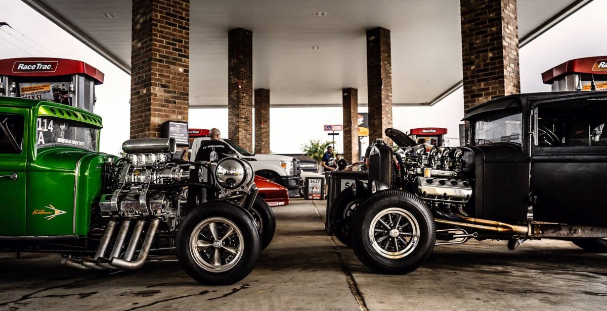 2 coupes at gas station c.jpg