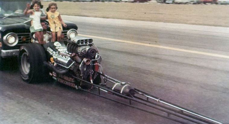 2  Gay Lynn, left, and Donna, riding with “Big” on a parade lap.JPG