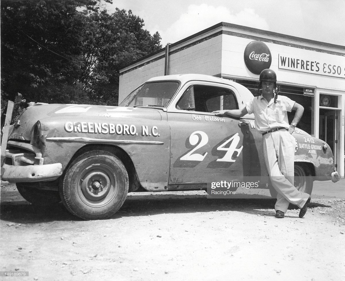 20  Bob Welborn with the Plymouth he drove on the NASCAR Cup circuit for car owner J. O. Goode.jpg