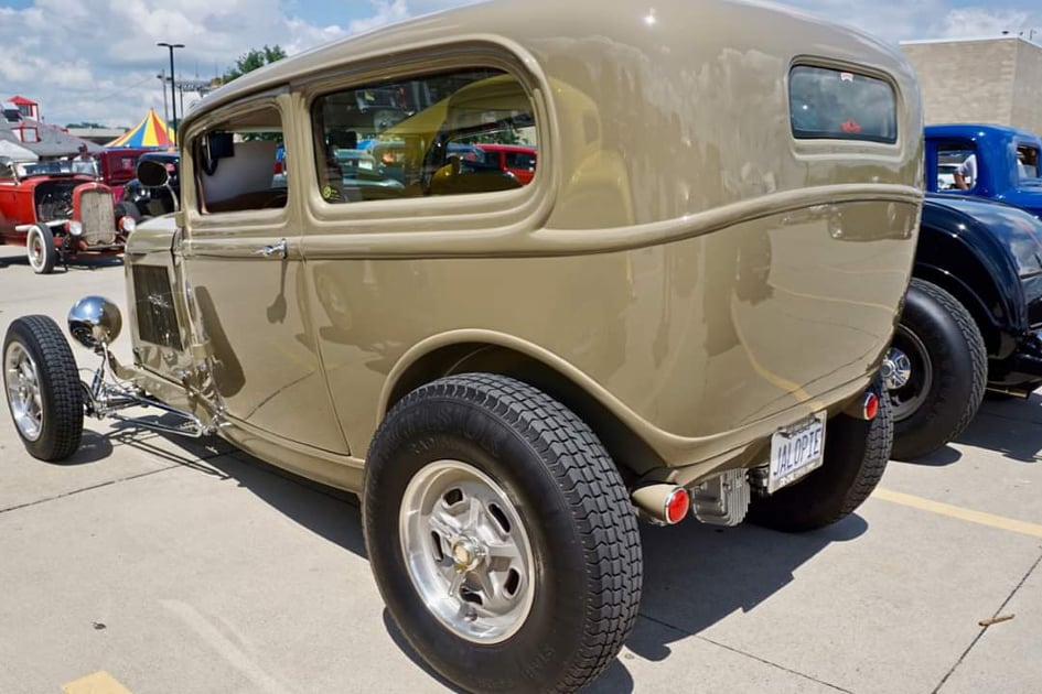2021 tan 32 2dr left rear.jpg