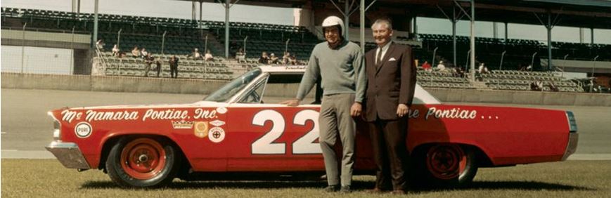 39a Fireball Roberts shows off a new race car for 1963..JPG