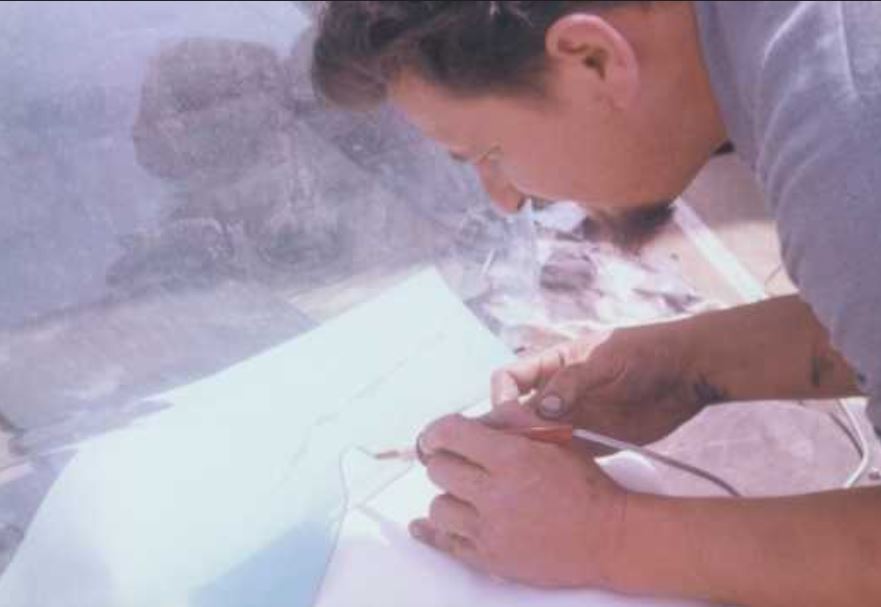 3a   Roth at work on Mysterion at his shop, 1963.JPG