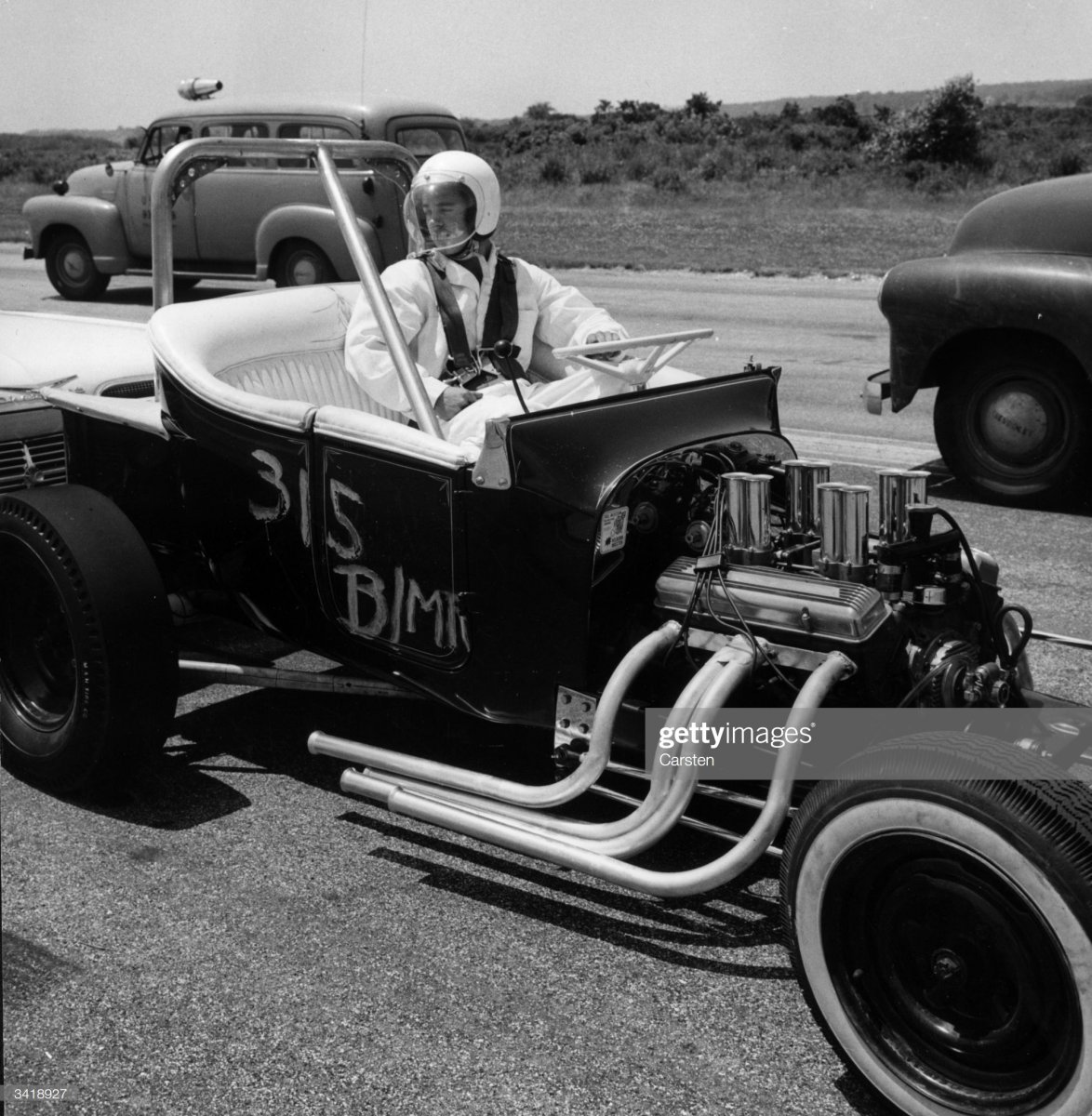 5 Willie Strickland in his modified Chevrole.jpg
