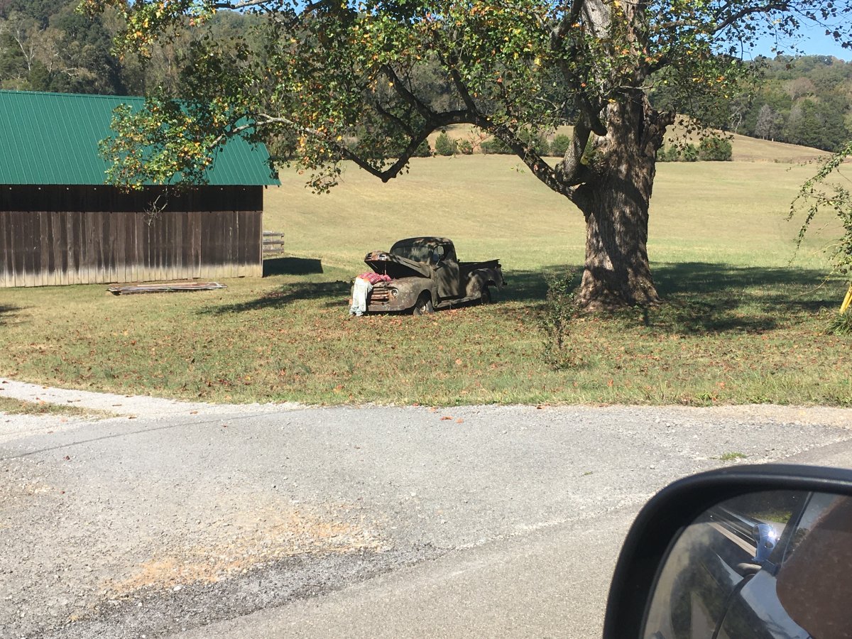 50 Ford Pickup hood up stuffed man.JPG