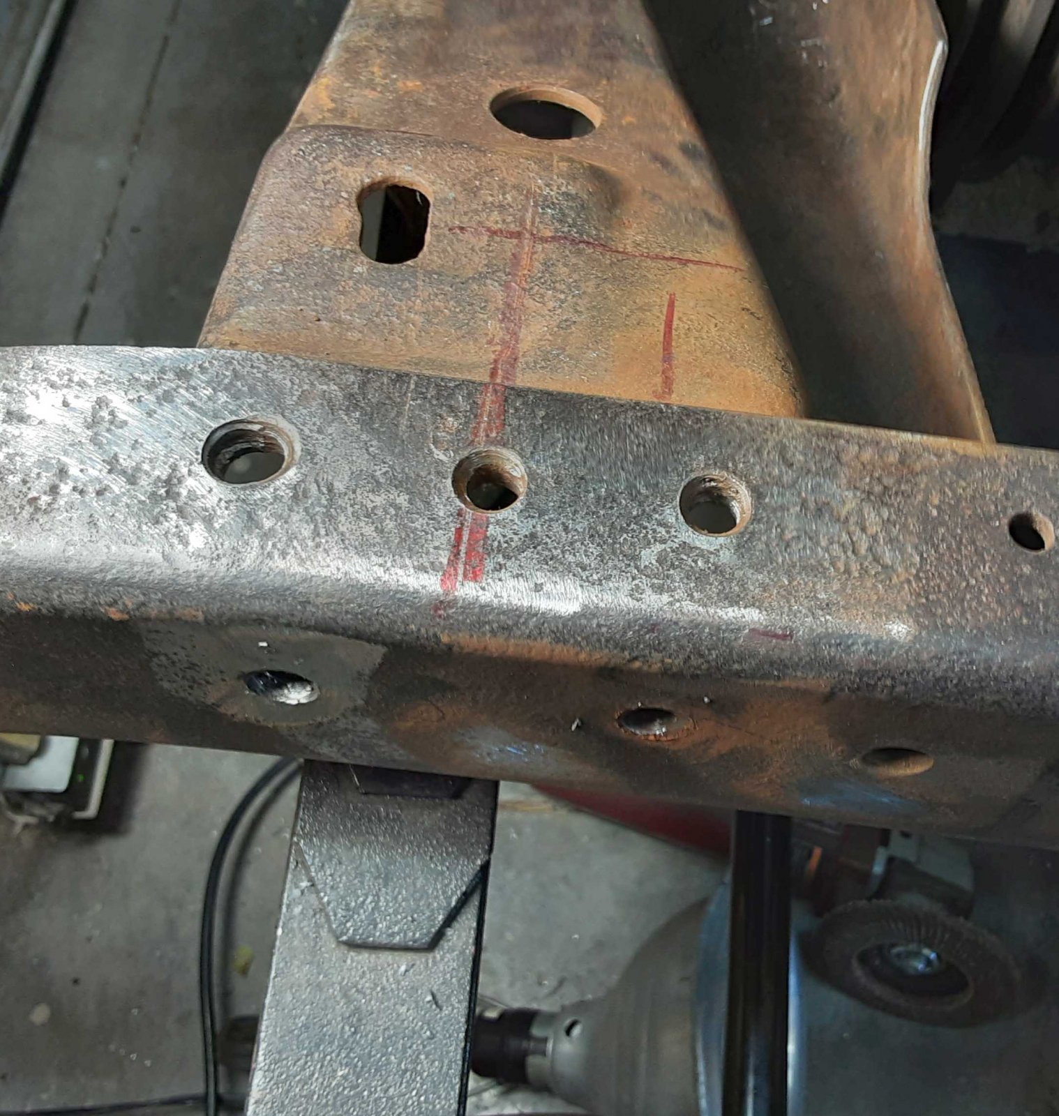 647 110121 Six of seven rivets drilled out.jpg