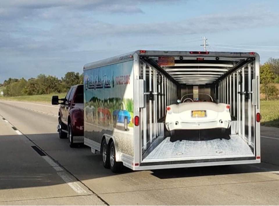 car painted carring Corvette in trailer.jpg