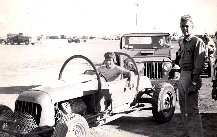 Charlie_Lutkie_in_car_Frank_Manley_standing.jpg