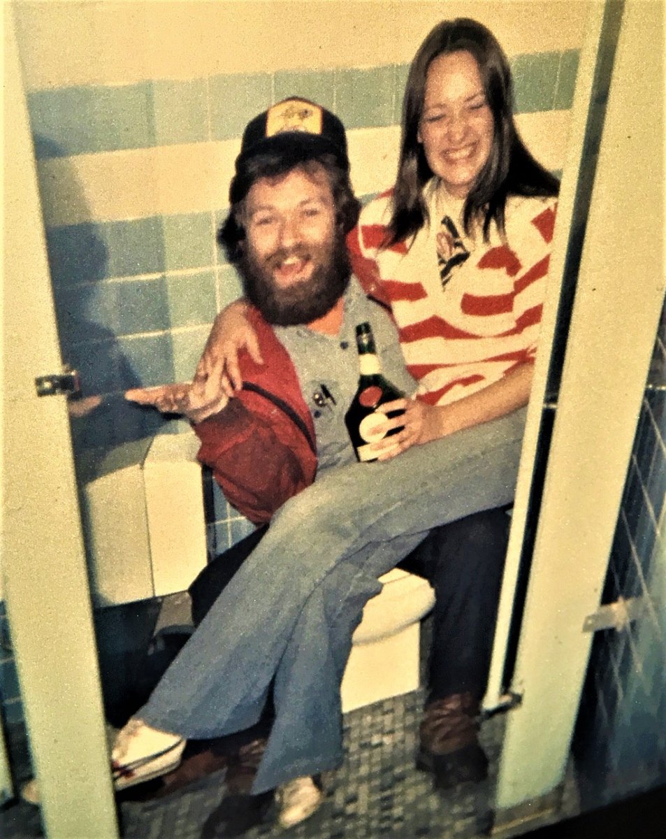 dennis and nancy in the womens bathroom dutch harbor.JPG