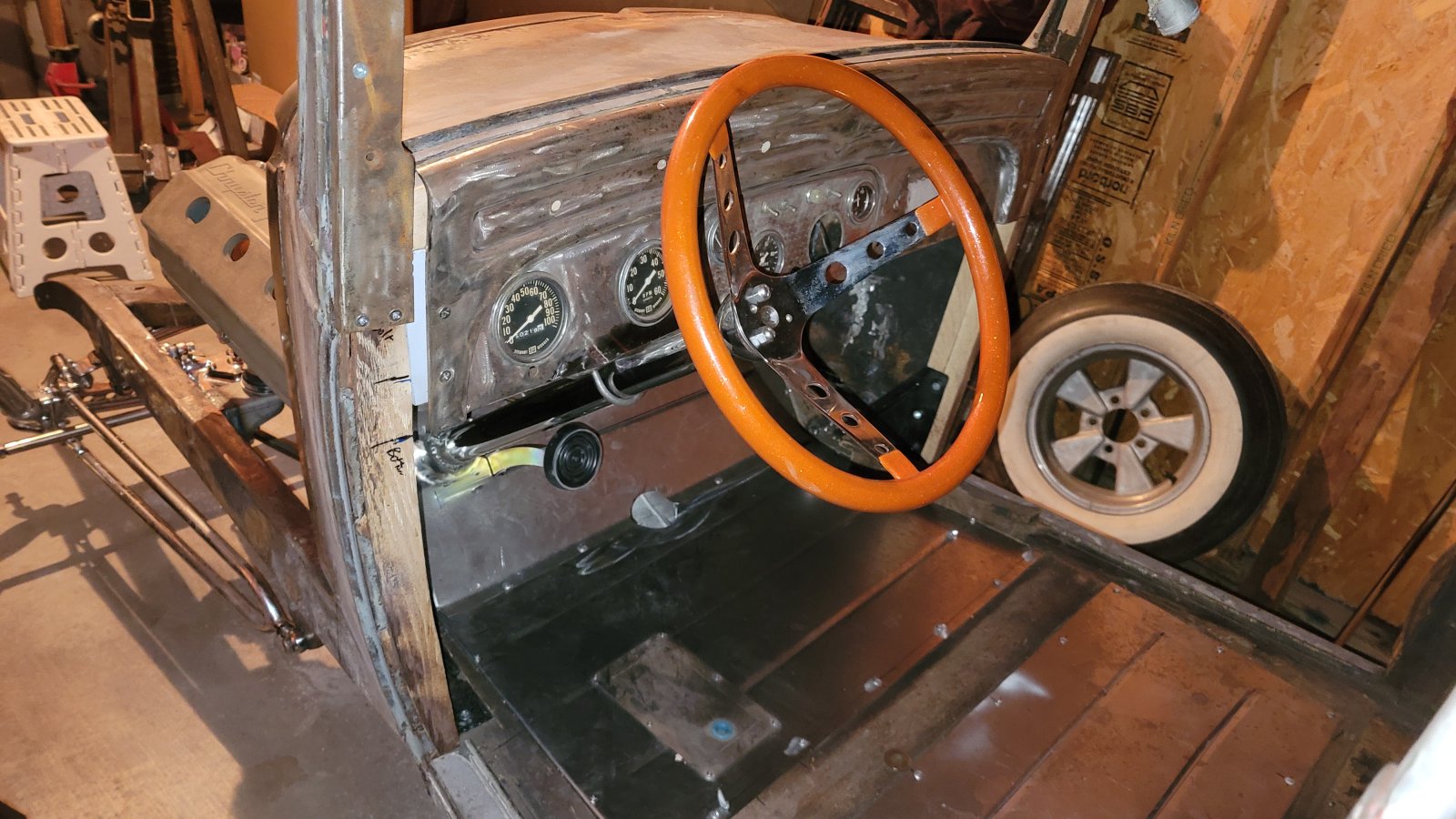 Driver's side interior view, also showing new wood for the door installation.jpg