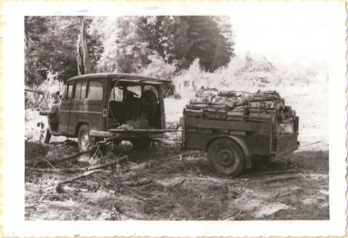 Familyhistory-1955WillysWagonworkingatcabin.JPG