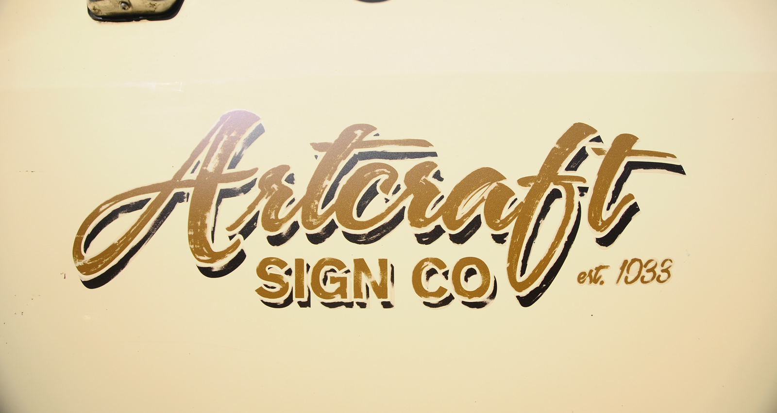 Hand lettered truck patina decal.jpg