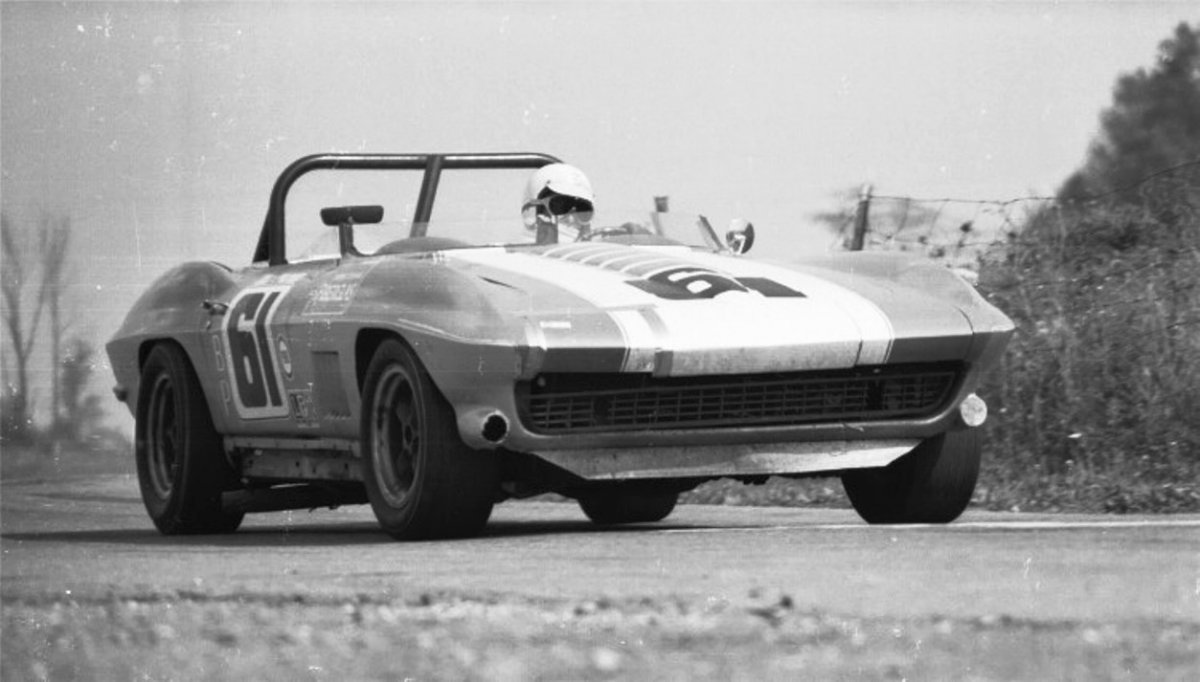 Hard charging Jerry Thompson in his Corvette C2 # 61...jpg