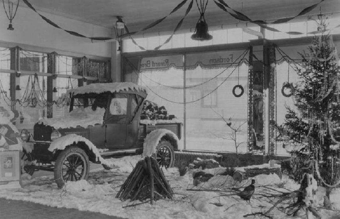 holiday Christmas car dealership 1927 Ford Christmas showroom.jpg