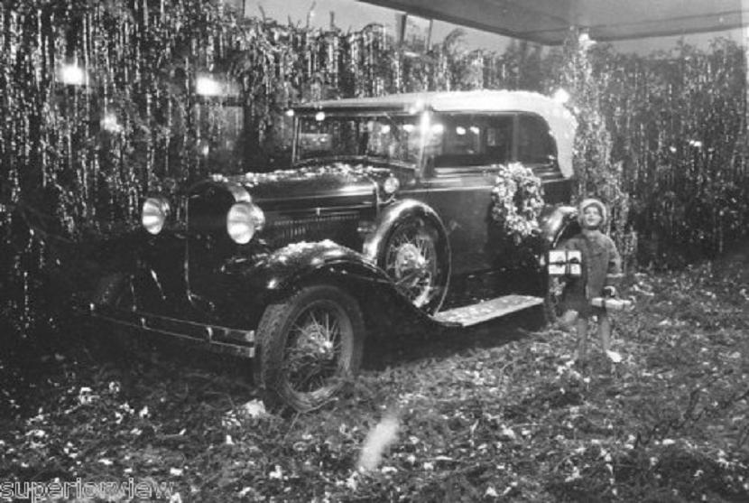 holiday Christmas car dealership 1929 Ford Model A in showroom at Christmas.jpg