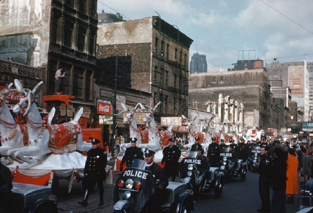 holiday Christmas street scene 1955 parade w-motorcycle.jpg