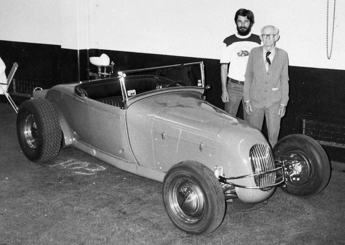 Jake with Bill Niekamp and the restored '50 AMBR.jpg