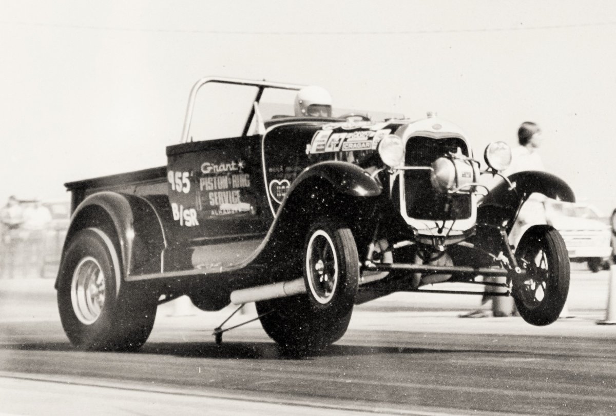 Jim Stevens wheelie.JPG