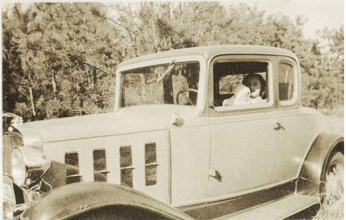 Marylin and Mom in Pop's 32 Chevy in Canada 1935.jpg