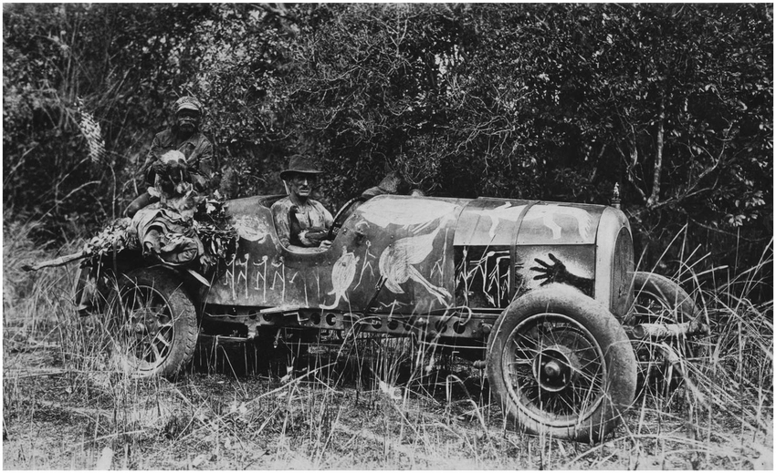 Nayombolmi-and-Francis-Birtles-in-the-painted-car-a-slightly-altered-Bean-Model-14-40.png