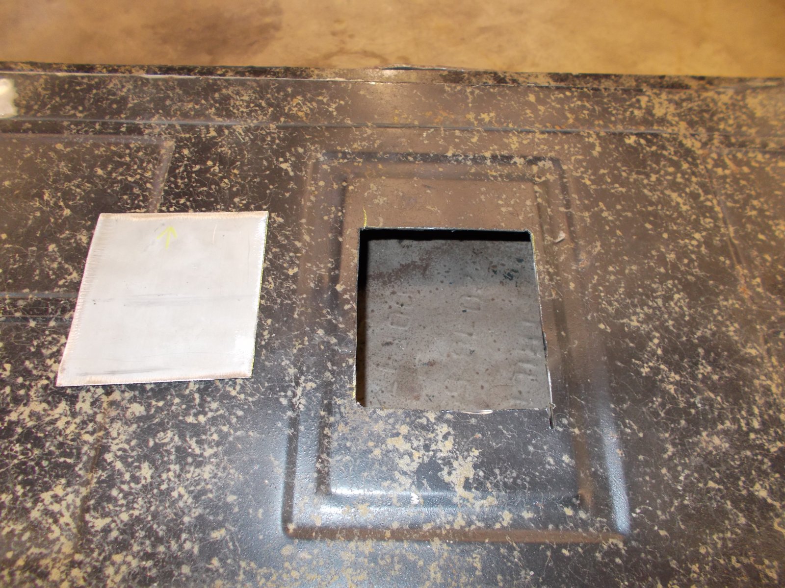 removing patch in trunk floor.JPG