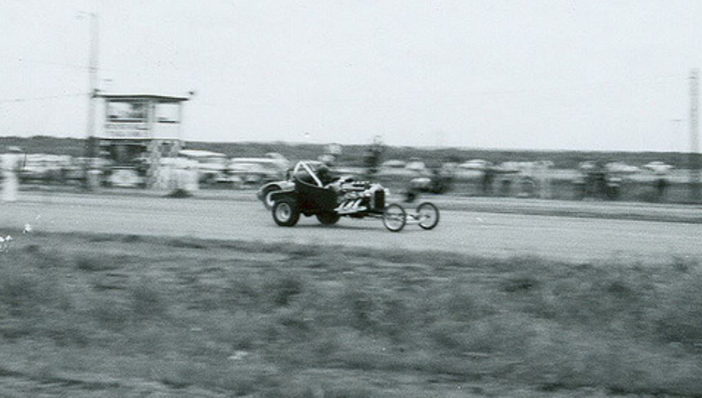 Robert Gillman's stretched out Ford T roadster with 409 Chevy power and road.JPG
