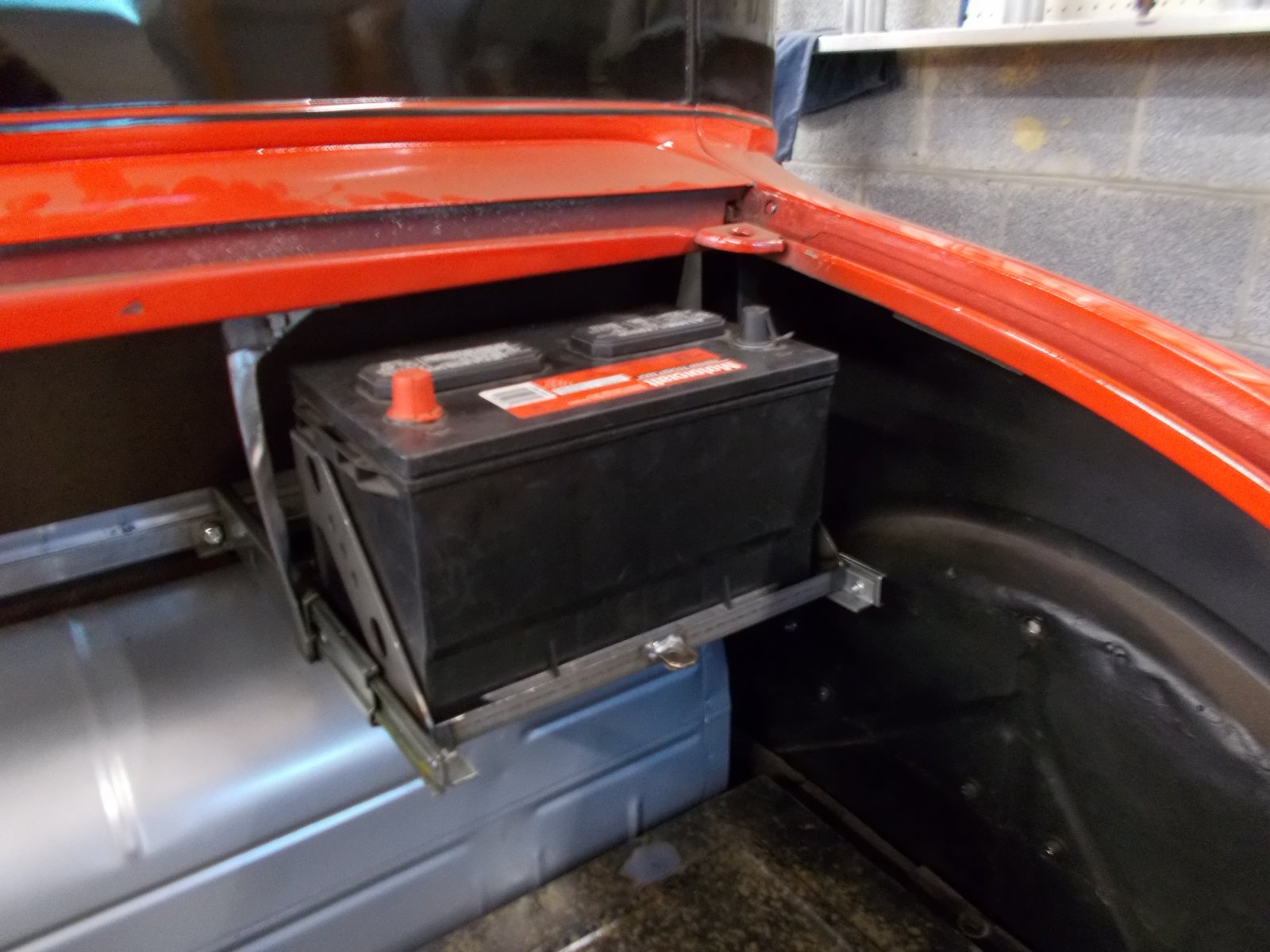 slide out battery tray in trunk.JPG