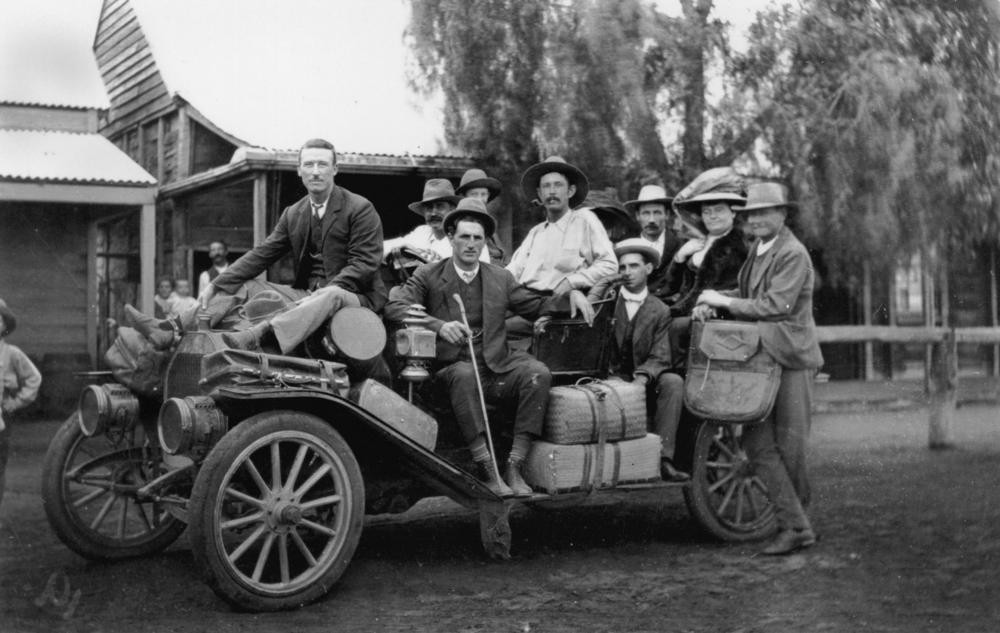 StateLibQld_1_108392_Passengers_in_a_Buick_service_car,_ca.1909.jpg