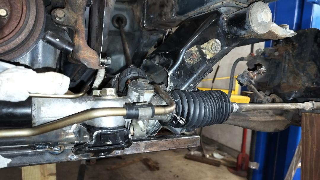 Steering rack rotated backwards to clear OEM compressor location you joint is at 30° b.jpg