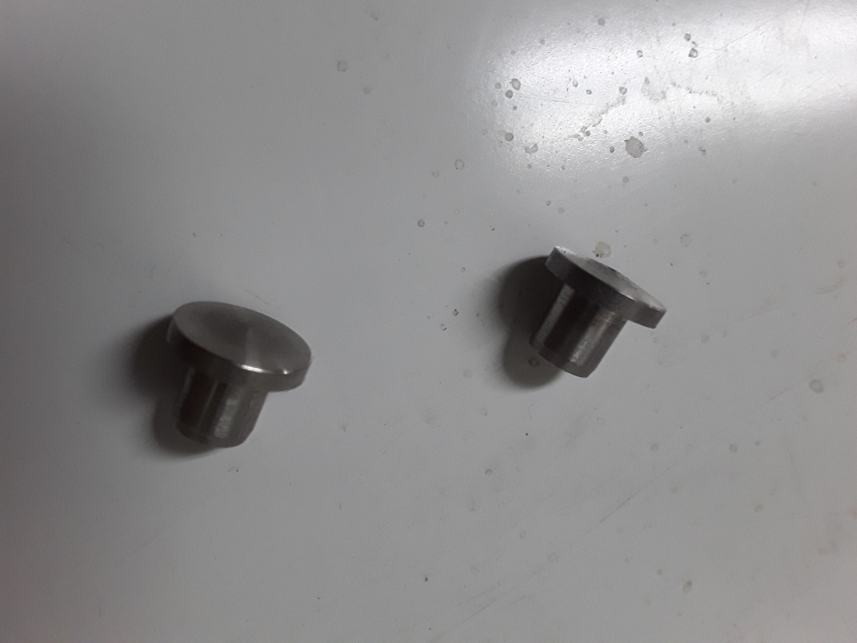 Stromberg choke shaft plugs 1.jpeg