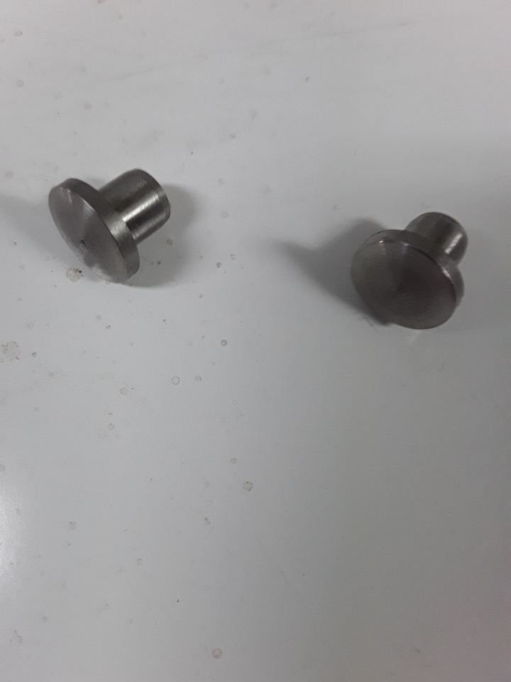 Stromberg choke shaft plugs 2.jpeg