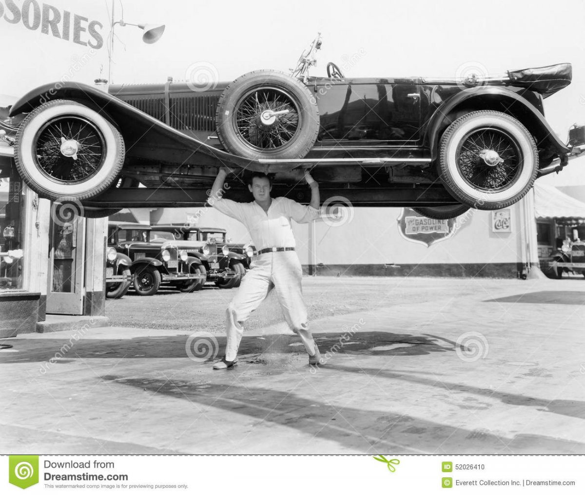 strong-man-lifting-car-over-his-head-52026410.jpg