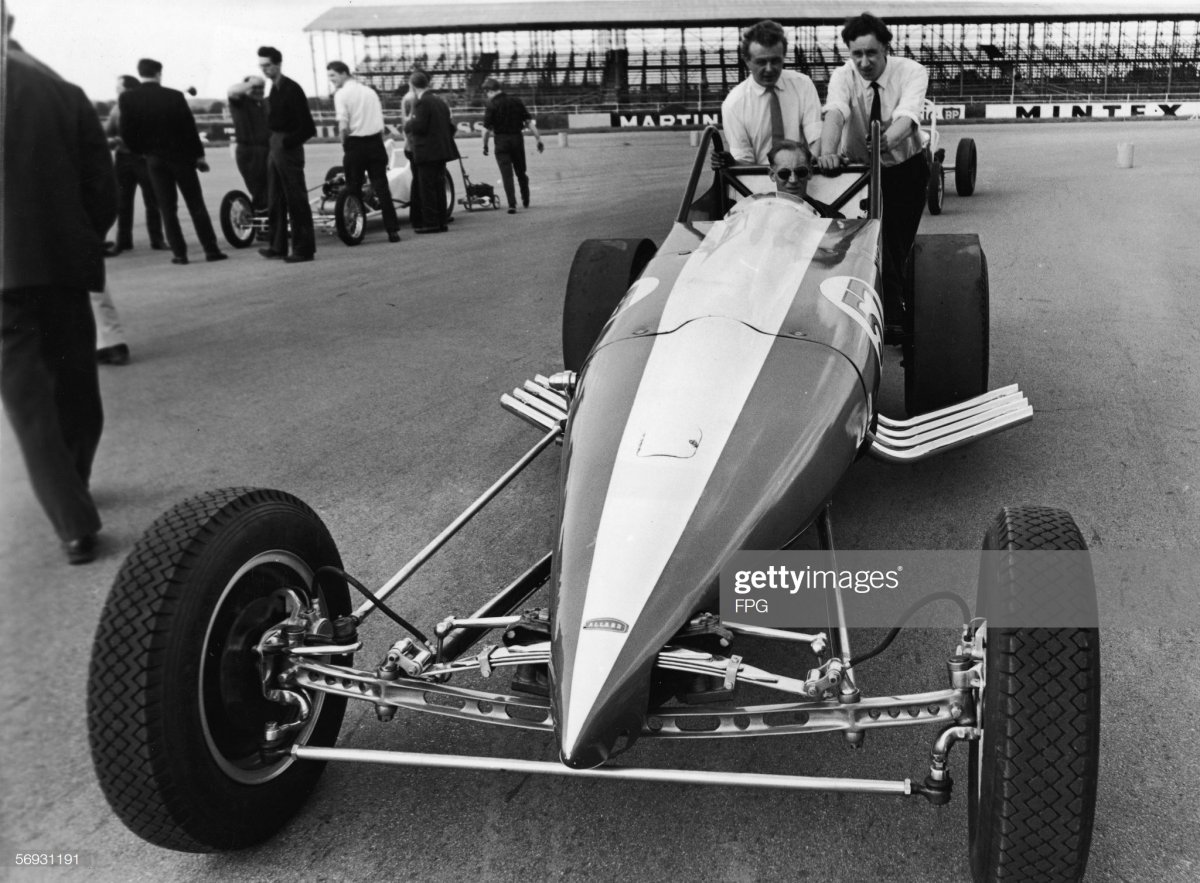 Sydney Allard (1910 - 1966) sits inside one of his custom-built.jpg