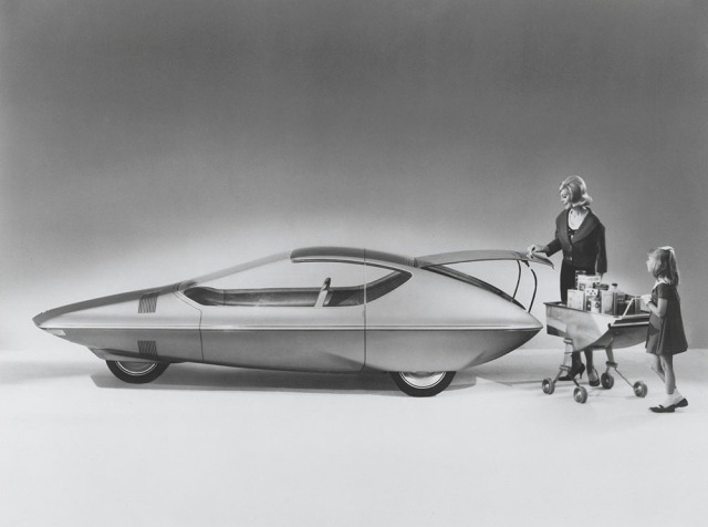 The Runabout, GM's 1964 concept car with three wheels and two built-in shopping carts.jpg