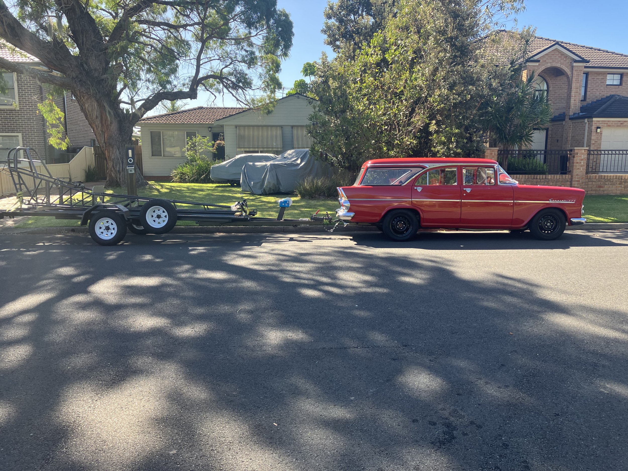 Towing - 1962 EK Holden towing FED chassis.jpeg