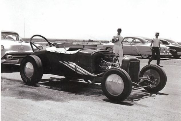 trunk of roadster 2 pipes.JPG