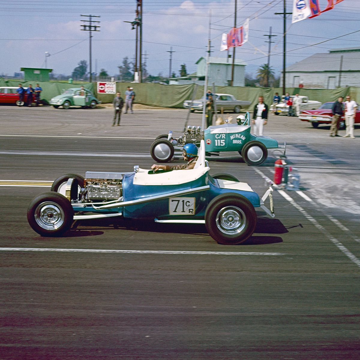 Two Ford Flathead-powered turtledeck CRoadsters square off at the starting line..jpg