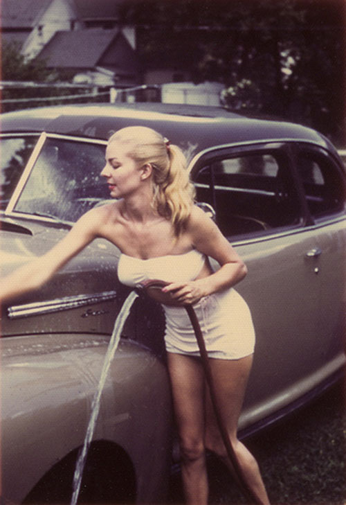 Vintage-Girl-washes-Rolls-900x.jpg