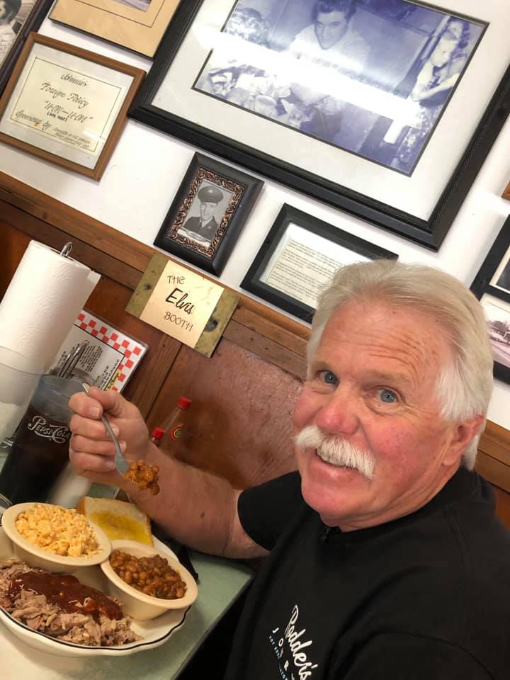 Wayne Carini in Johnnie's Drive In BBQ (Tupelo, MS) - in Elvis booth.jpg