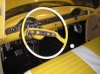 Interior with 61 Impala wheel.jpg